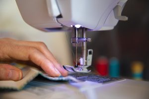 engage in sewing as a hobby